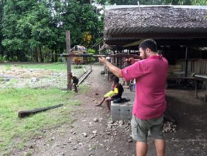 Image of Jason with speargun WasPapa made for him.