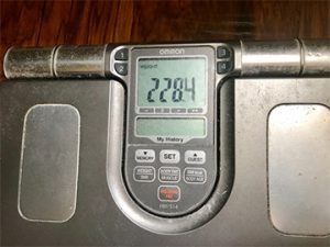 Image of scale showing weight of 228.4